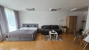 Postel nebo postele na pokoji v ubytování Apartmány v Zlatej uličke
