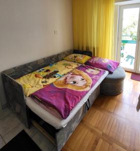 Postel nebo postele na pokoji v ubytování Apartmani Mira