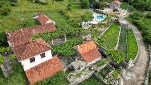 an aerial view of a house with roofs at Gazdinstvo Vukanović - Kuća za odmor in Trebinje