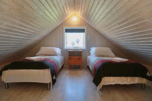 Postel nebo postele na pokoji v ubytování Eldhraun Holiday Home