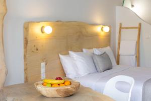 Postelja oz. postelje v sobi nastanitve Olympa Suites