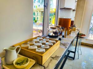 a counter with a tray of cupcakes in a kitchen at BB Hotel&Resort in Phu Quoc