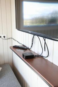 TV a/nebo společenská místnost v ubytování Eldhraun Holiday Home