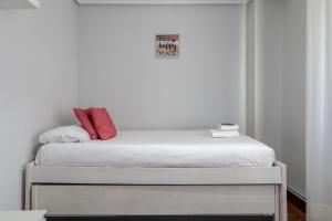 Łóżko lub łóżka w pokoju w obiekcie Etxebarria apartment by People Rentals