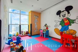 Enfants séjournant dans l'établissement LUX The Bonnington JLT Suite