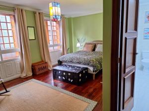 Ένα ή περισσότερα κρεβάτια σε δωμάτιο στο Pasanteria apartments