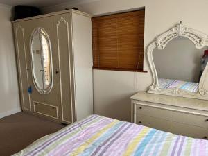 Ένα ή περισσότερα κρεβάτια σε δωμάτιο στο Lexington Place