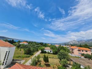 a view of a small town with houses and trees at Batea 1 in Seline +4 photos