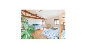 Setusvæði á Chambre triple deluxe - Gîte de la Louve