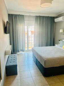Ένα ή περισσότερα κρεβάτια σε δωμάτιο στο Kyra's Central Flat