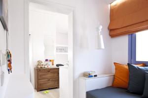 Kuchyň nebo kuchyňský kout v ubytování Acqua Vatos Santorini Hotel