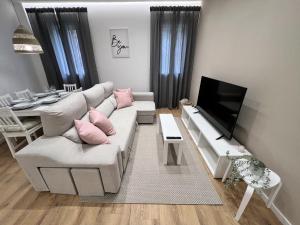 TV a/nebo společenská místnost v ubytování Apartamenticos Plaza Las Armas III
