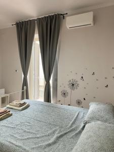 Cama o camas de una habitación en Casa Affitto Breve Frattamaggiore