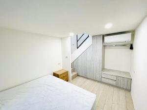 Giường trong phòng chung tại 礁溪楓禾Maple