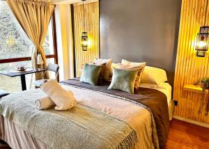 Postel nebo postele na pokoji v ubytování BlackBird Moreno1