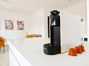 Η κουζίνα ή μικρή κουζίνα στο Olympus A1 - by Verde Apartments