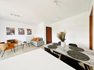 Ένα ή περισσότερα κρεβάτια σε δωμάτιο στο Olympus A1 - by Verde Apartments