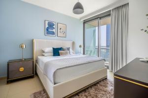 Postel nebo postele na pokoji v ubytování GuestReady - Glowing Retreat near Burj Khalifa