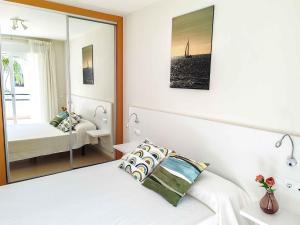 Postel nebo postele na pokoji v ubytování Asuncion Paraiso de Vera