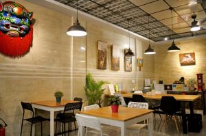 Restoranas ar kita vieta pavalgyti apgyvendinimo įstaigoje Lu-Kang Traveler Inns