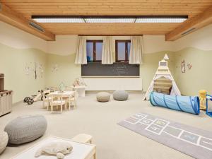 Posedenie v ubytovaní Genuss - und Vitalhotel Moisl