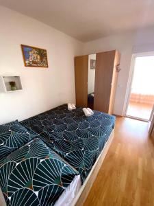 Fotografie z fotogalerie ubytování APARTMANI GOGA s grijanim bazenom v destinaci Dobropoljana