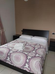 Postel nebo postele na pokoji v ubytování Casa Galileo