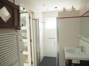 Koupelna v ubytování B&B Bureau Warmoesstraat