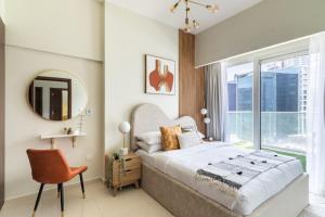 Postel nebo postele na pokoji v ubytování GuestReady - Upscaled Living in Reva Residence
