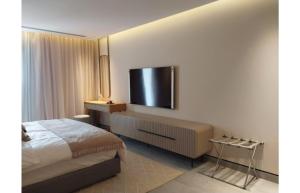 Postel nebo postele na pokoji v ubytování Serviced apartment, North coast + 7 fotografií