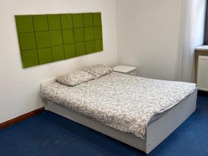 Katil atau katil-katil dalam bilik di Genius Rooms- 24h self check-in