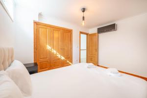 GuestReady - Pleasant stay in Encarnação tesisinde bir odada yatak veya yataklar