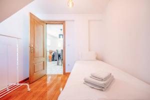 GuestReady - Pleasant stay in Encarnação tesisinde bir odada yatak veya yataklar