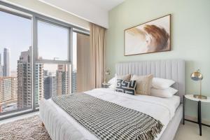 Postel nebo postele na pokoji v ubytování GuestReady - Residência de luxo com vista para o topo da linha do horizonte