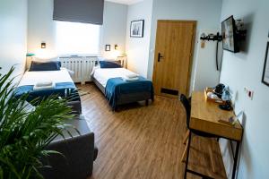 Postel nebo postele na pokoji v ubytování Sleep Port B&B - bezpłatny parking