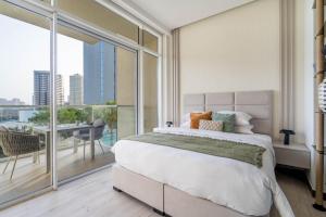Postel nebo postele na pokoji v ubytování GuestReady - Glowing spot in JVC