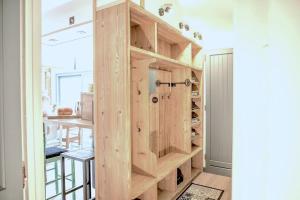 a wine cellar with a wooden door in a room at Stylish place-Amazing Views-3 main lifts, Apt design- vue splendide-3 Telecabines in Samoëns