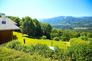 an aerial view of a field with a house and trees at Stylish place-Amazing Views-3 main lifts, Apt design- vue splendide-3 Telecabines in Samoëns