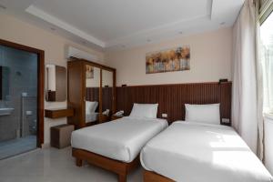 Postel nebo postele na pokoji v ubytování Dream Inn Pyramids View