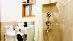 Phòng tắm tại Olive Serviced Apartments - Vasant Vihar
