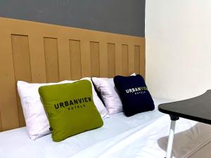 Postel nebo postele na pokoji v ubytování Urbanview De Path House Syariah Boyolali