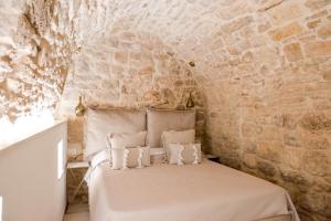 Postel nebo postele na pokoji v ubytování Fiscardi Room