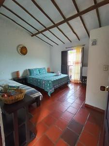 Hotel Campestre Casona del Camino Real客房内的一张或多张床位