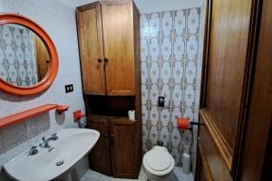 Ванная комната в Domus fedonia vintage apartment +6 фотографий