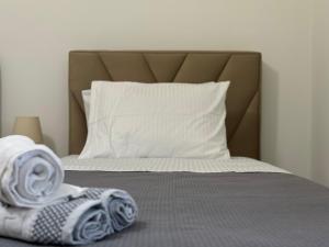 Postel nebo postele na pokoji v ubytování Angelo Agapi Rooms Vlore + 37 fotografií