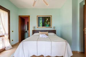 Кровать или кровати в номере Villa Rosa sul mare