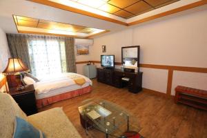 Postel nebo postele na pokoji v ubytování First Place B&B (Hualien Railway Station)