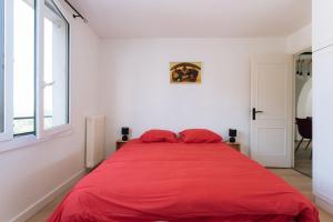מיטה או מיטות בחדר ב-GuestReady - Calm and Charm near Bois de Boulogne