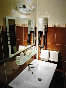 Koupelna v ubytování Hotel Saint-Aignan