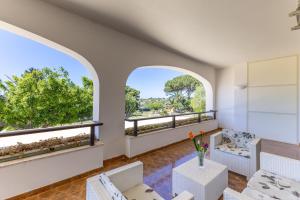 A balcony or terrace at Villa Morenanoemi - private pool